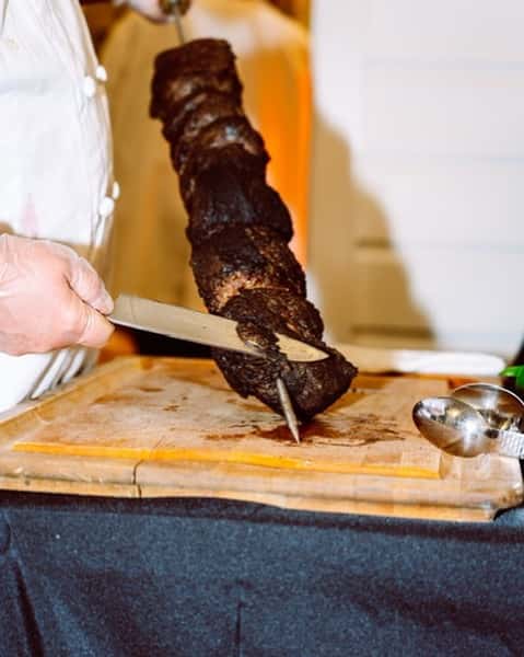 Brazilian inspired Barbecue. Traditional Beef Picanha. Smells and tastes like fire, smoke and perfectly cooked beef. Carved from the sword with three chimichurri sauces. #picanha #brazillianbbq #smokeandfire #hillcountrycatering #hillcountryweddings #fredericksburgtx #comforttx #boernetexas #cateringlife