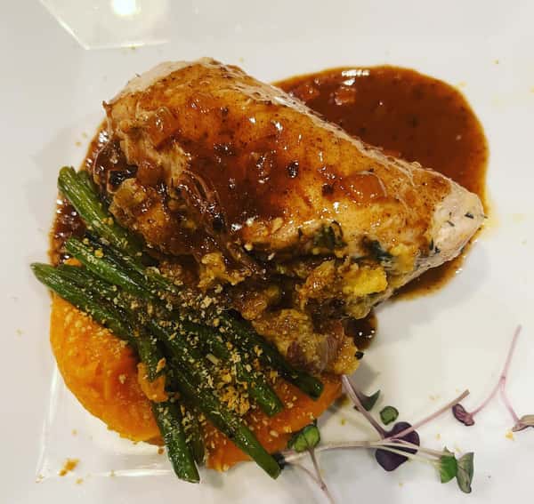 The Harvest Dinner at Messina Hof complete with grape stomping was fun and ended with a Double Cut Pork Loin Chop filled with Cornbread, Cherries, Apples and Tasso Ham. #fallfood #comfortfood #hillcountrytexas #hillcountrylife #fredericksburgtx #boerne #comforttx #masontx