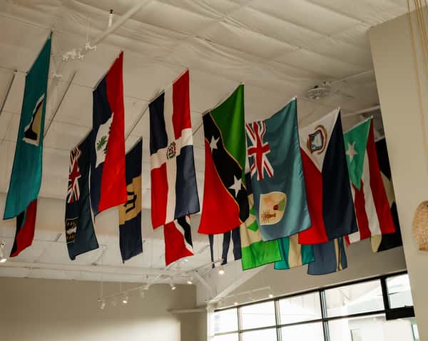 caribbean flags handing from ceiling