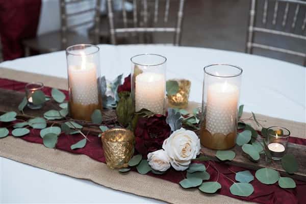 flower and candle centerpiece on a table