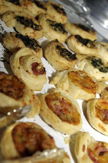 catering display of stuffed pinwheels with spinach