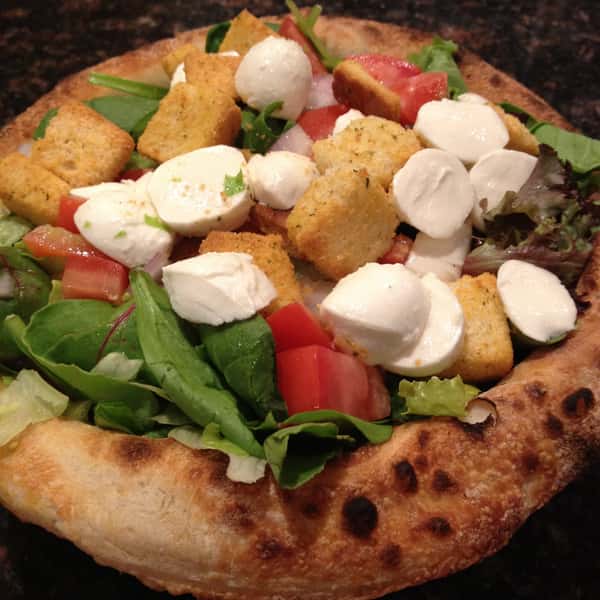 Salad within a bread bowl