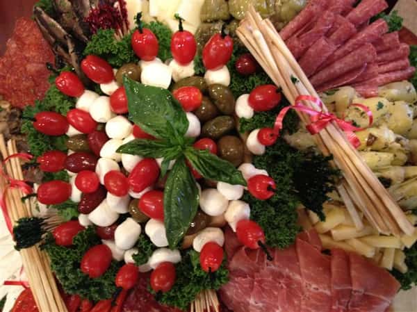 Arangement of meats, cheeses, and vegetables