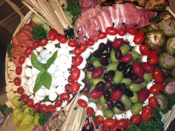 Arangement of meats, cheeses, and vegetables