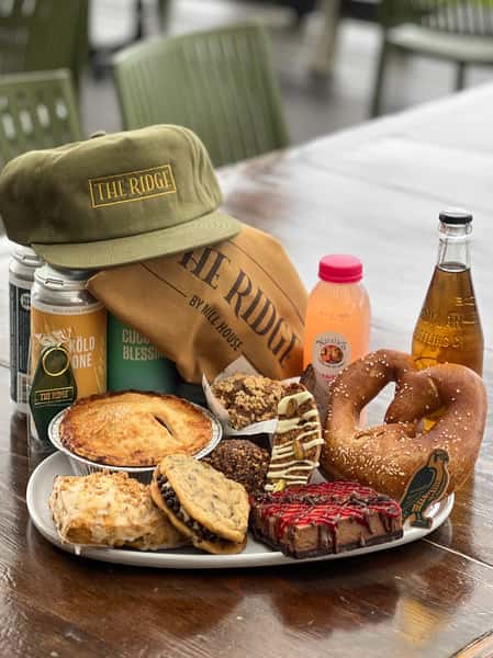 A collection of goods; hat, baked goods, drinks