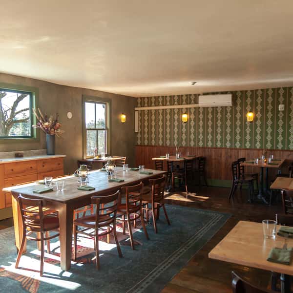 Private dining room showing tables, chairs, and decor