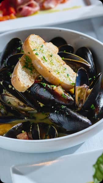 🦪🍷 Indulge in our delectable Mussel Appetizer!

Savor tender mussels bathed in a fragrant garlic white wine sauce, perfect for dipping with our crispy Italian crostini toast.

Join us at Carbonara Trattoria for this delightful starter that will tantalize your taste buds!

#MusselAppetizer #GarlicWhiteWineSauce #CarbonaraTrattoria #DunwoodyEats #ItalianCuisine #SeafoodLovers #FoodieFavorites #appetizergoals