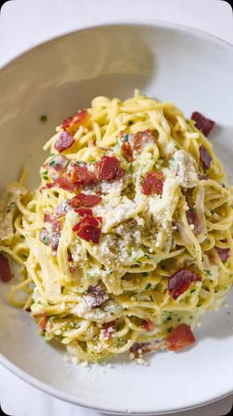 🍝✨ Indulge in the authentic taste of Italy with our Signature Spaghetti Carbonara, prepared the traditional way!

Crafted with al dente spaghetti, crispy guanciale, creamy egg yolks, and freshly grated Pecorino Romano, this classic dish embodies the rich culinary heritage of Rome.

Join us at Carbonara Trattoria to savor this timeless favorite.

#SpaghettiCarbonara #CarbonaraTrattoria #AuthenticItalian #DunwoodyEats #ItalianCuisine #TraditionalRecipe #FoodieFavorites #pastaperfection