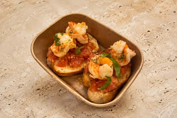 Italian-style bruschetta topped with prawns, tomatoes and fresh herbs from Ciao Bella