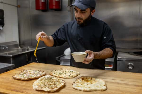 Chef prepping Naan