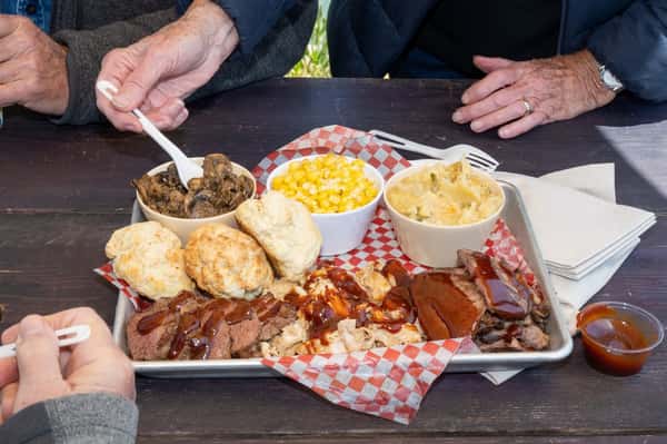 platter of bbq and sides