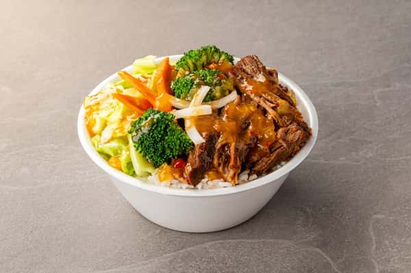 B&C Teriyaki beef rice bowl with broccoli, carrots, cabbage, onions, and savory teriyaki sauce