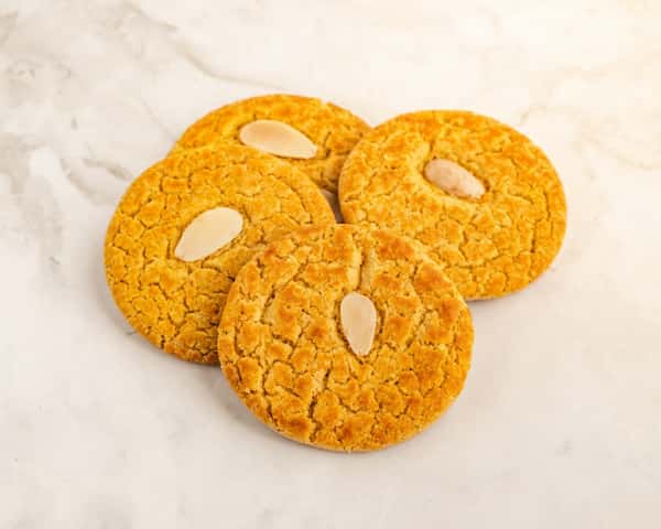 Golden almond-topped cookies served as a sweet dessert at B&C Teriyaki