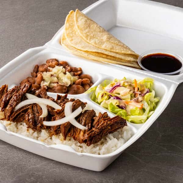 B&C Teriyaki beef plate with steamed rice, pinto beans, fresh salad, corn tortillas, and teriyaki sauce