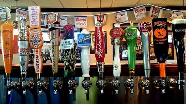 Row of variety of beer taps