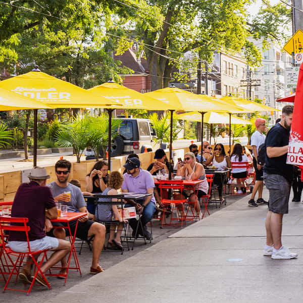 people enjoying food outside