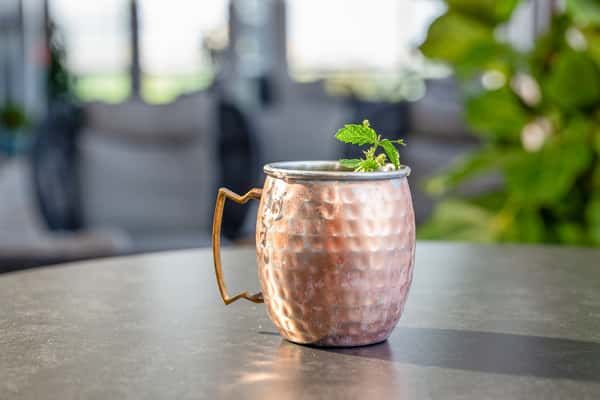Whiskey Charlie Mule served in a copper mug at the rooftop cocktail lounge in Washington, DC