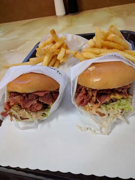 burgers and fries on tray