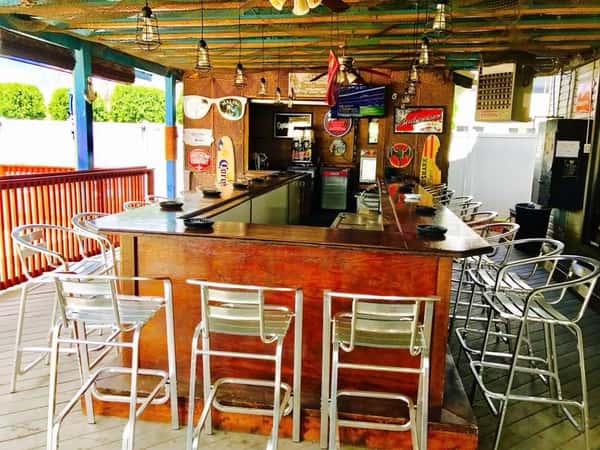 Outside bar with chairs around the counter