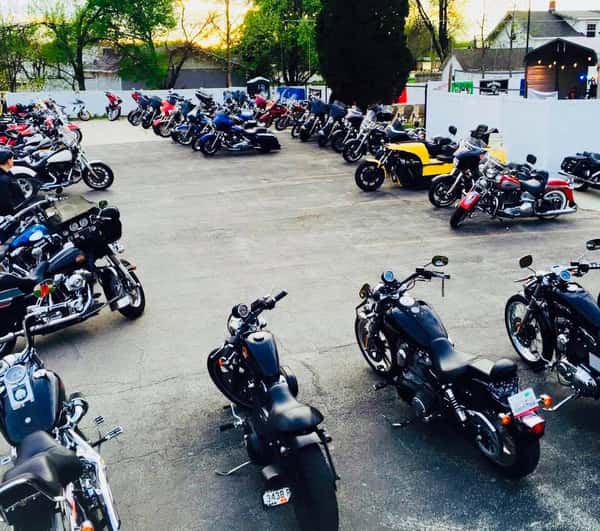 Parking lot filled with motorcyles