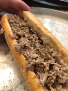 cheesesteak on a grill