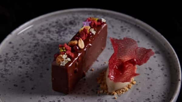 What stands out about Stubborn Seed's culinary philosophy and dining experience?