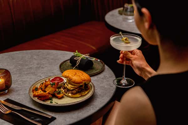 A WOMAN IN FINE DINING