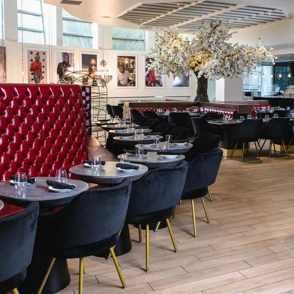 High back red booth dining and velvet black chairs