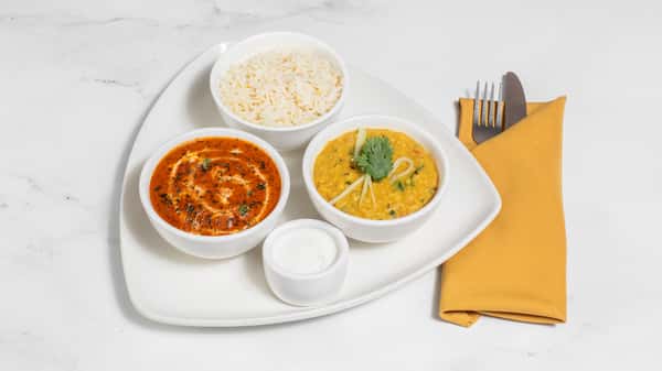 Pulled tandoori chicken in our signature sauce, yellow dal, basmati rice, and raita
