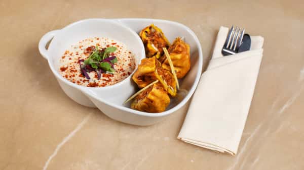 Batter crispy fried eggplant, yogurt, curry leaves, mustard & air-dried chili garlic