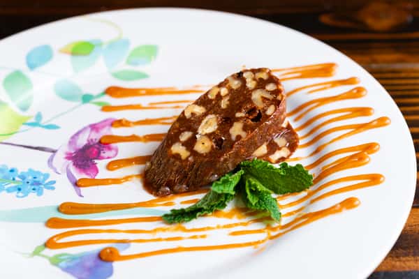 Chocolate Sausage with Walnuts, Raisins topped Caramel Sauce