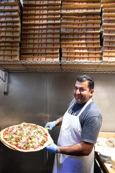 Chef holding a pie