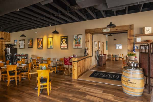 Interior dining space with wooden finishes and warm lighting
