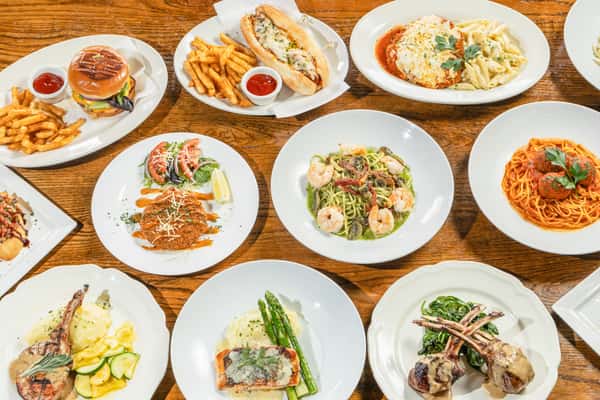Variety of food laid on a wooden table
