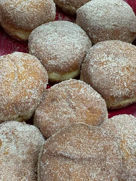 Apple Filled Cinnamon covered Donut
