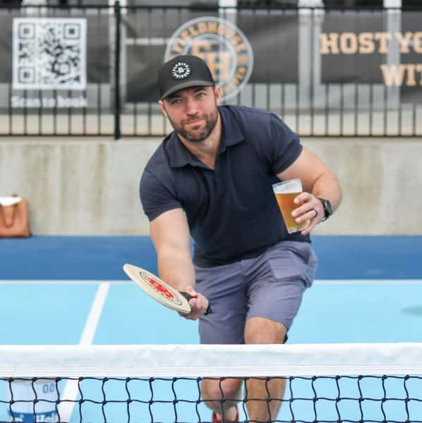 man playing pickle ball