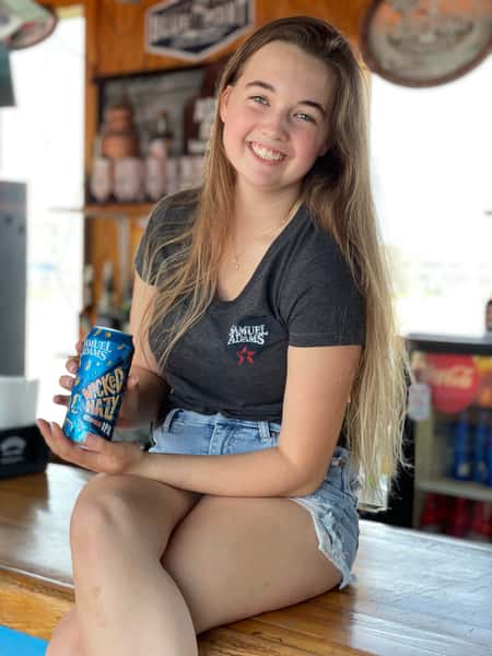 Employee holding drinks at The Pier Patio Pub