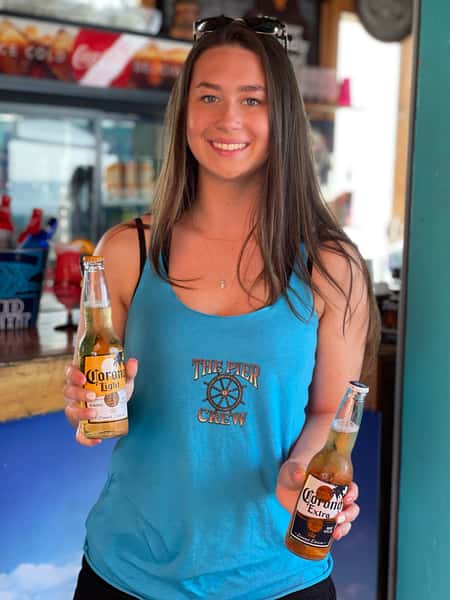 Employee holding drinks at The Pier Patio Pub