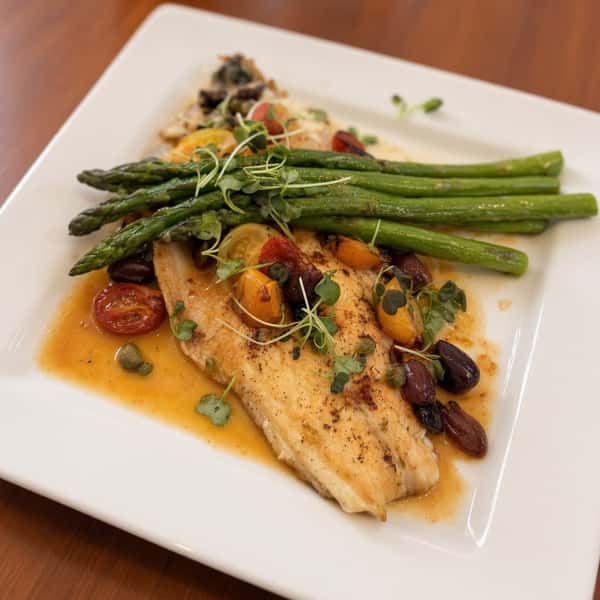 Pan-seared Branzino with cherry tomatoes, black olives, lemon-caper sauce and asparagus.
Stop in this weekend from 3-8 for our chef inspired dinner features!