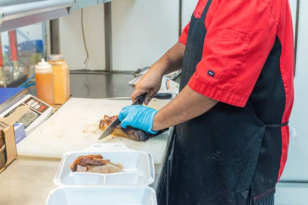 Staff cutting bbq