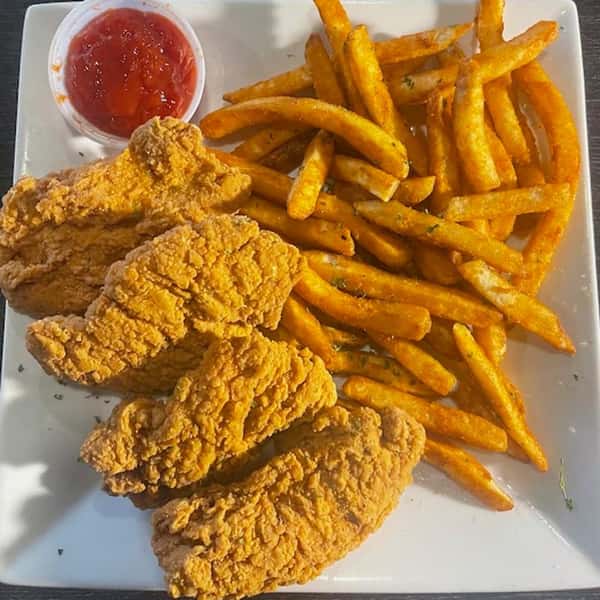 A hearty plate of golden fried chicken tenders served with seasoned French fries and a side of ketchup on a square white plate.