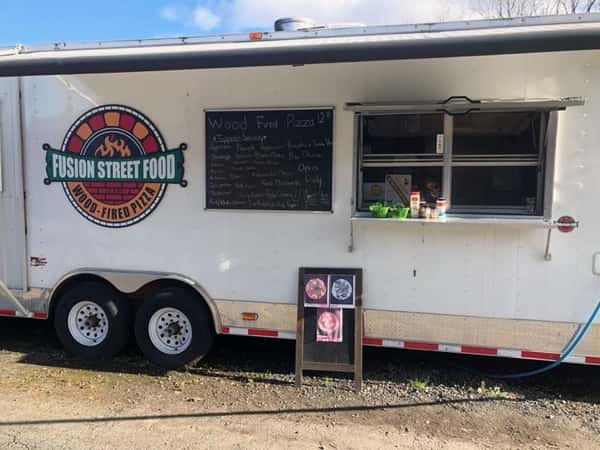 Food truck with pizza oven with Fusion Street Label on side