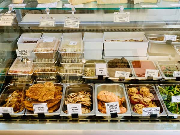 food on display behind the counter