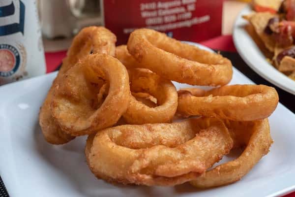 assortment of onion rings on a plate