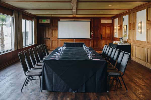 tables and chairs setup for corporate
