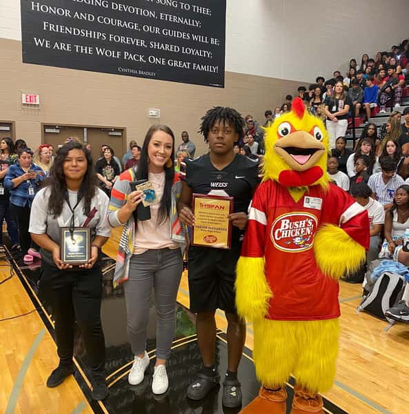student athletes with Chuck the chicken