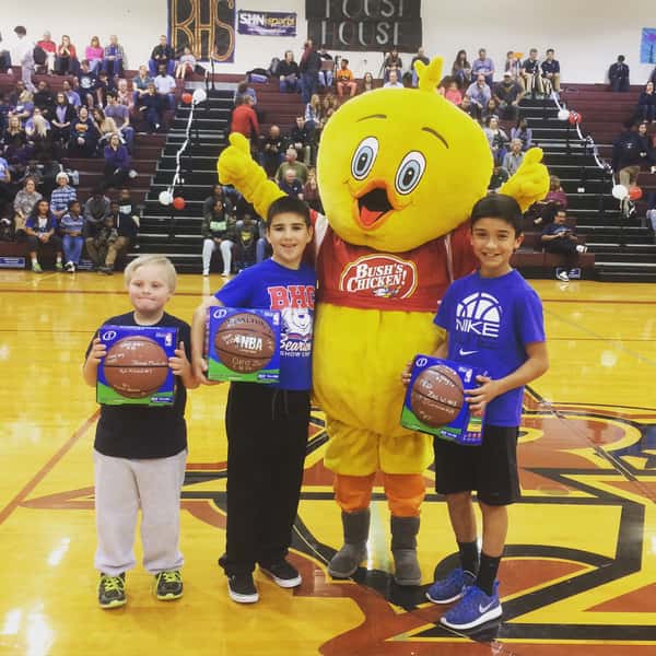 Chuck the Chicken with student athletes