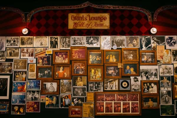 wall of framed vintage photos