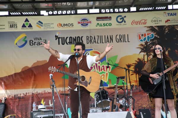 Artists on stage at community event