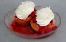 A dessert served with strawberry sauce